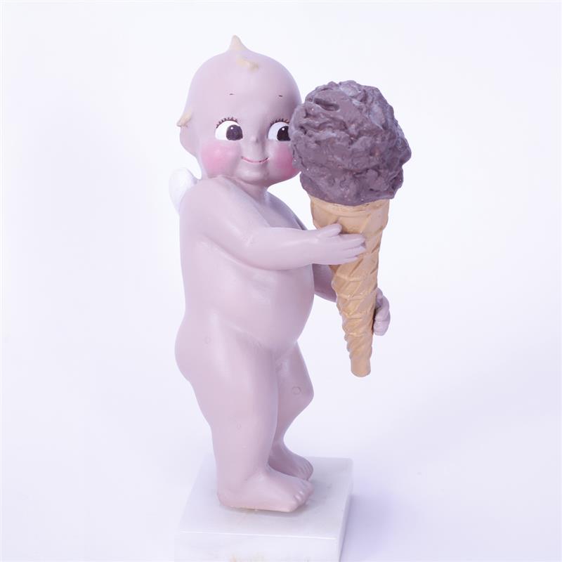 Appraisal: Plaster Kewpie Doll Holding Large Ice Cream Cone on marble