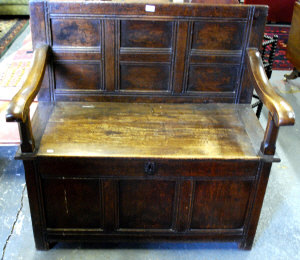 Appraisal: A late th century oak joint coffer converted to a