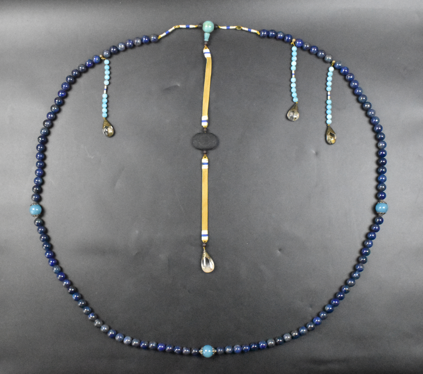 Appraisal: A Chinese lapis beeds necklace After the necklaces worn in