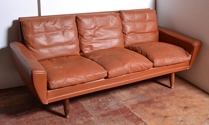 Appraisal: DANISH THREE SEATER LEATHER SOFA