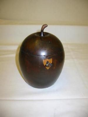 Appraisal: A FRUITWOOD TEA CADDY modelled as an apple the hinged