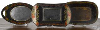 Appraisal: Three tole bread trays th c retaining their original polychrome