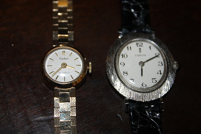 Appraisal: A CT GOLD LADY'S WRIST WATCH by Cudax together with