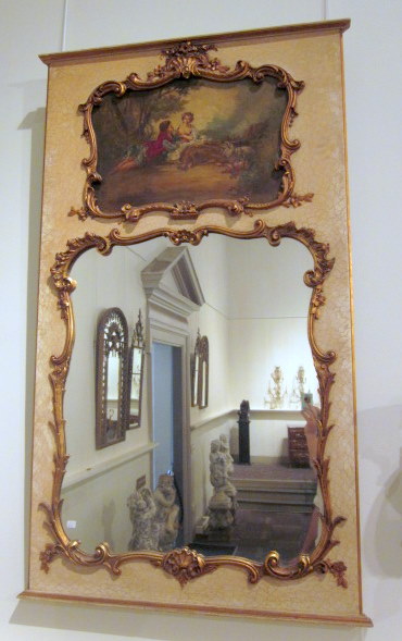 Appraisal: Louis XV style painted trumeau mirror The shaped p late