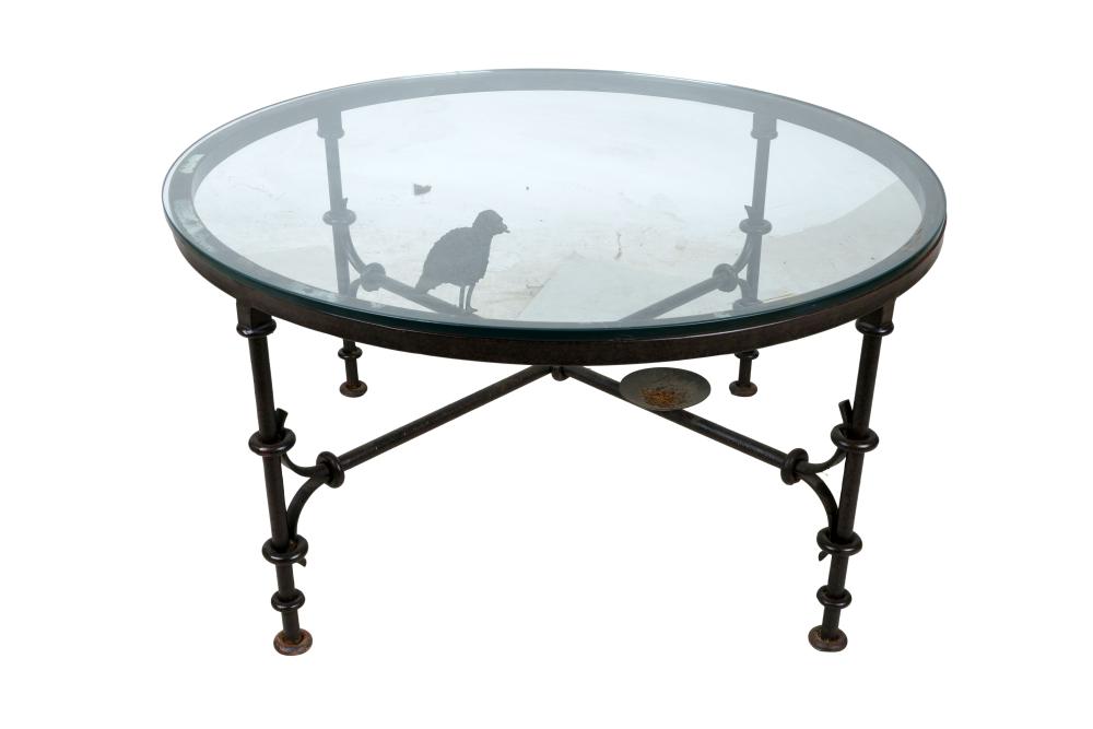 Appraisal: GIACOMETTI STYLE CIRCULAR IRON BASE COCKTAIL TABLEwith an applied bird