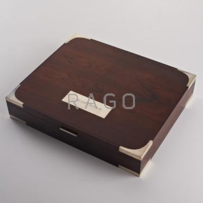 Appraisal: HANS HANSEN Sterling mounted rosewood box with fitted interior Denmark