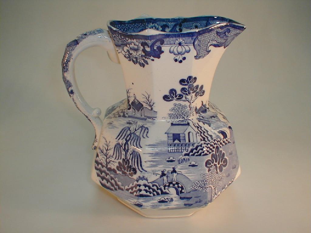 Appraisal: A Masons pottery blue printed toilet ewer decorated with fishermen