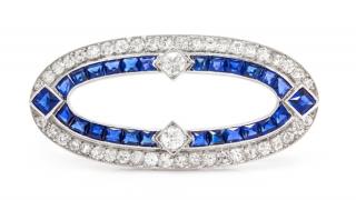 Appraisal: An Art Deco Platinum Diamond and Sapphire Brooch Cartier dwts