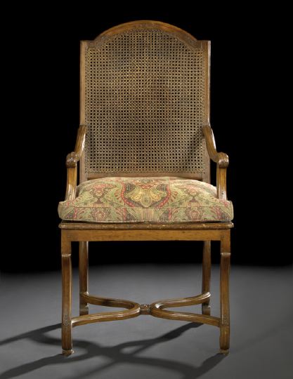 Appraisal: Regence-Style Provincial Fruitwood and Caned Fauteuil late th century the