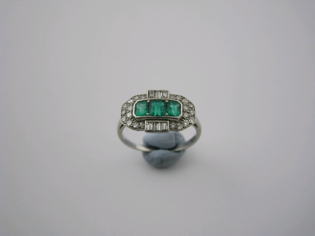 Appraisal: An Art Deco Emerald and Diamond Ring pav -set three