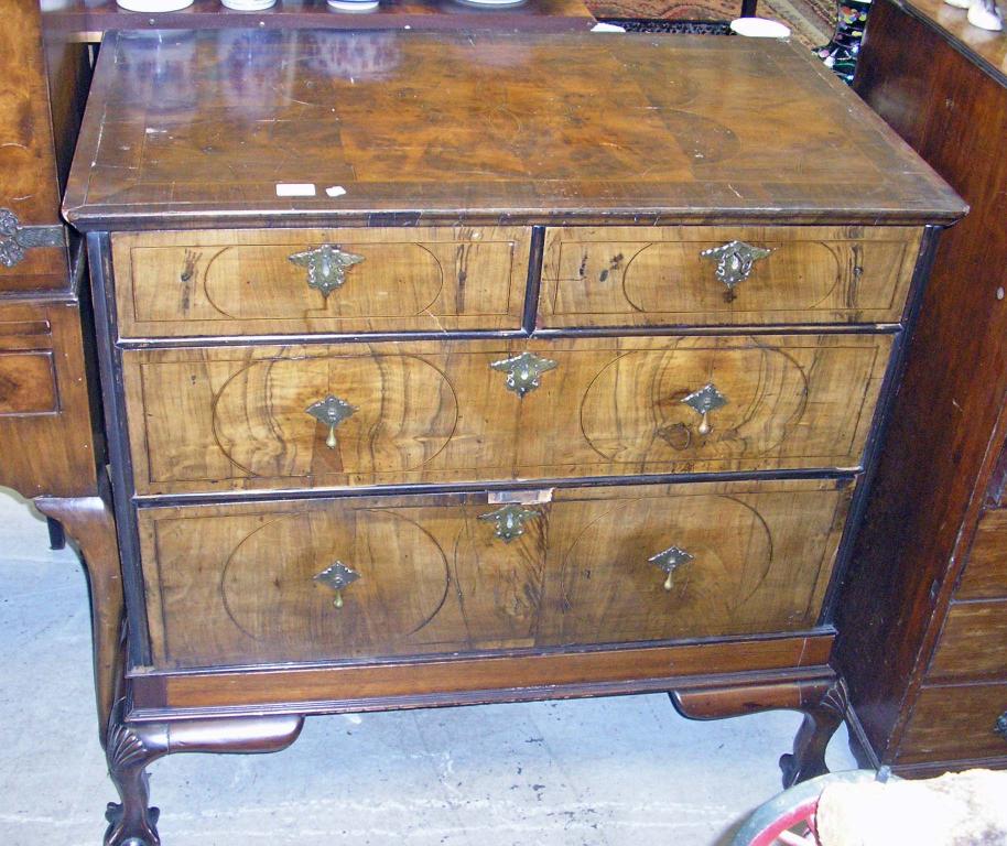 Appraisal: A William Mary walnut chest of drawers with later base