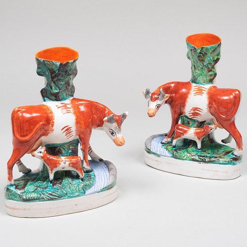 Appraisal: PAIR OF STAFFORDSHIRE COW GROUP SPILL VASESUnmarked x x in