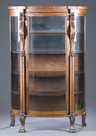 Appraisal: Ebert's Furniture Company Oak China Cabinet Curved glass front Carved