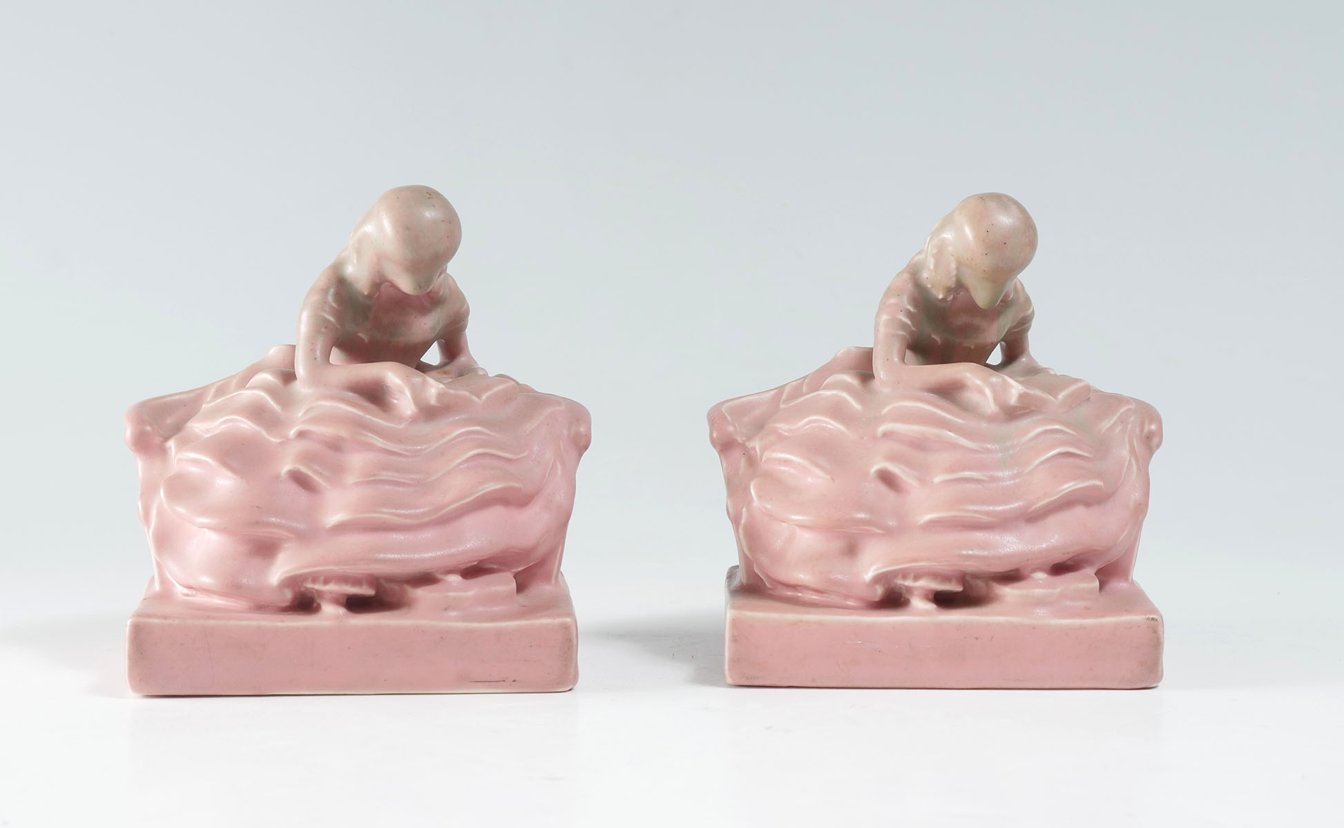 Appraisal: PAIR ROOKWOOD BOOKENDS - GIRL READING Pair of Rookwood bookends