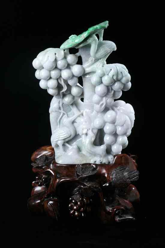 Appraisal: CHINESE LAVENDER AND APPLE GREEN JADEITE CARVING OF BIRDS AND