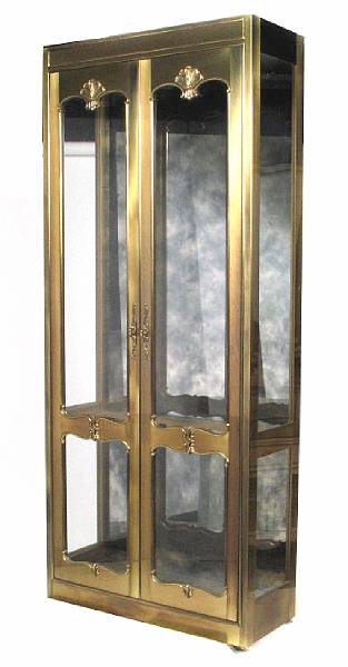 Appraisal: A gilt metal and glass vitrine one broken glass shelf