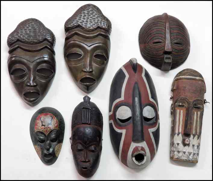 Appraisal: COLLECTION OF MASKS Together with carved wood figures Condition No