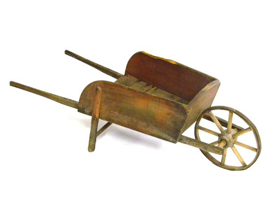 Appraisal: Child's wheelbarrow remnants of early finish wooden spoke wheels with