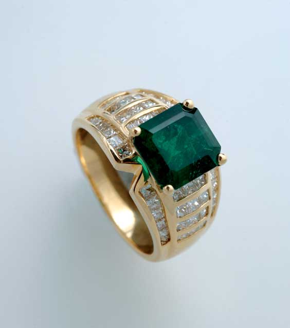 Appraisal: EMERALD DIAMOND AND K GOLD RING Emerald diamond and K