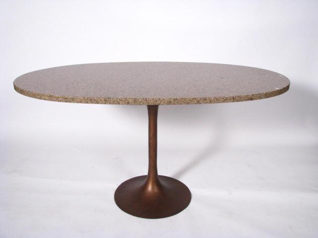 Appraisal: Mid-century style table with oval granite top tapered metal pedestal