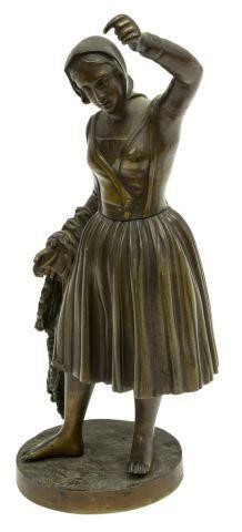 Appraisal: Patinated bronze sculpture woman holding a fishing net in her