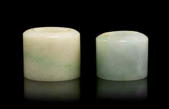 Appraisal: Two Chinese Jade Archer's Rings one having apple green inclusions