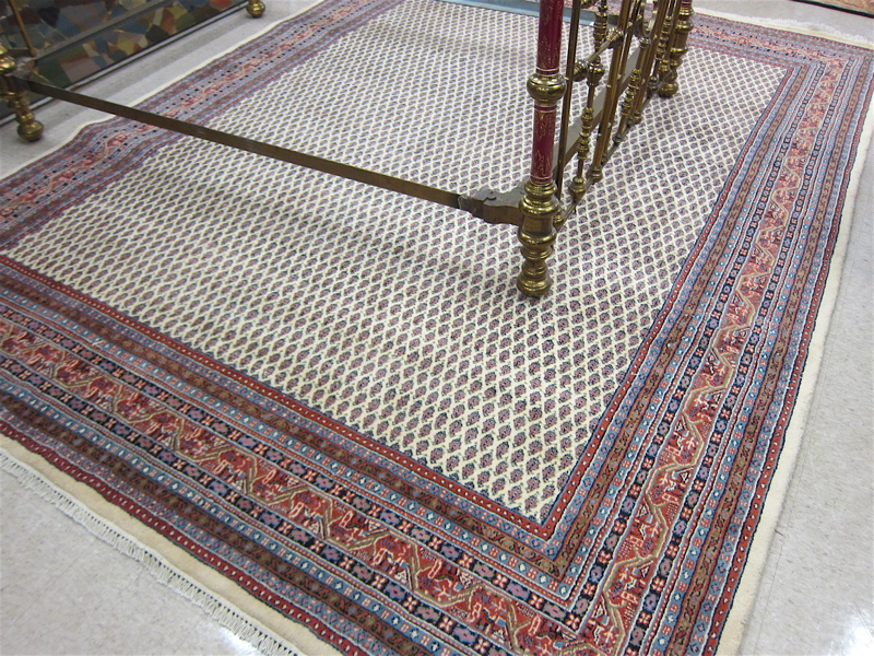 Appraisal: HAND KNOTTED ORIENTAL CARPET Indo-Persian Persian Boteh-Miri design originating from