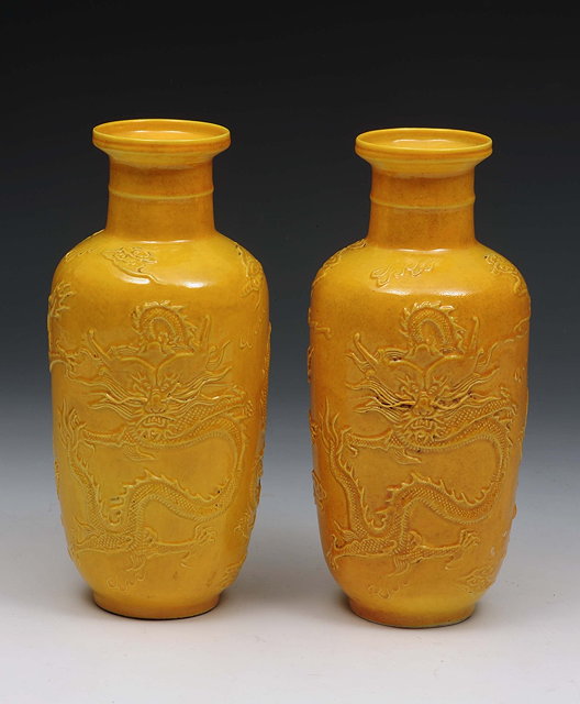 Appraisal: A pair of Chinese yellow ground vases th Centuryeach with