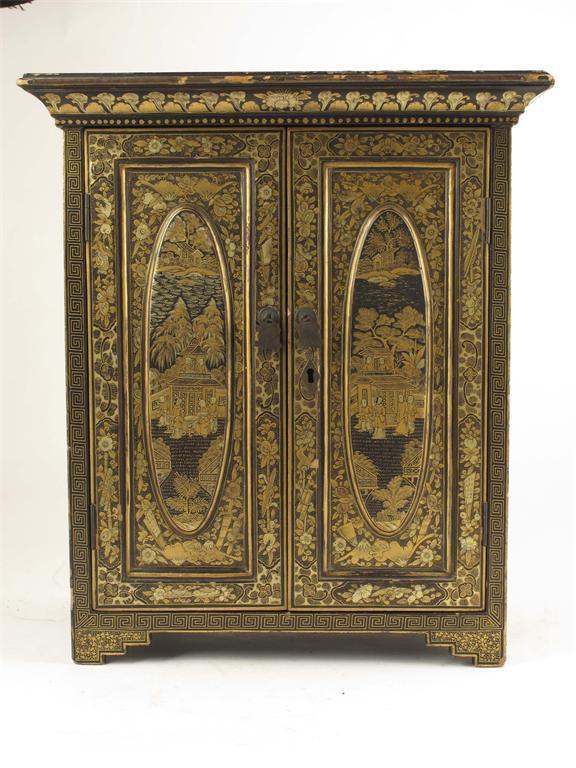 Appraisal: A late th century Chinese export lacquer table cabinet