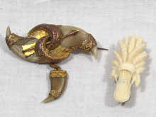 Appraisal: A mixed lot comprising an antique tiger's claw brooch with