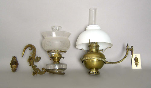 Appraisal: Three wall mount fluid lamps early th c together with