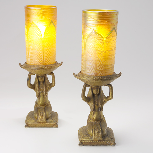 Appraisal: Derand pair of incense lamps with Egyptian figural bases supporting