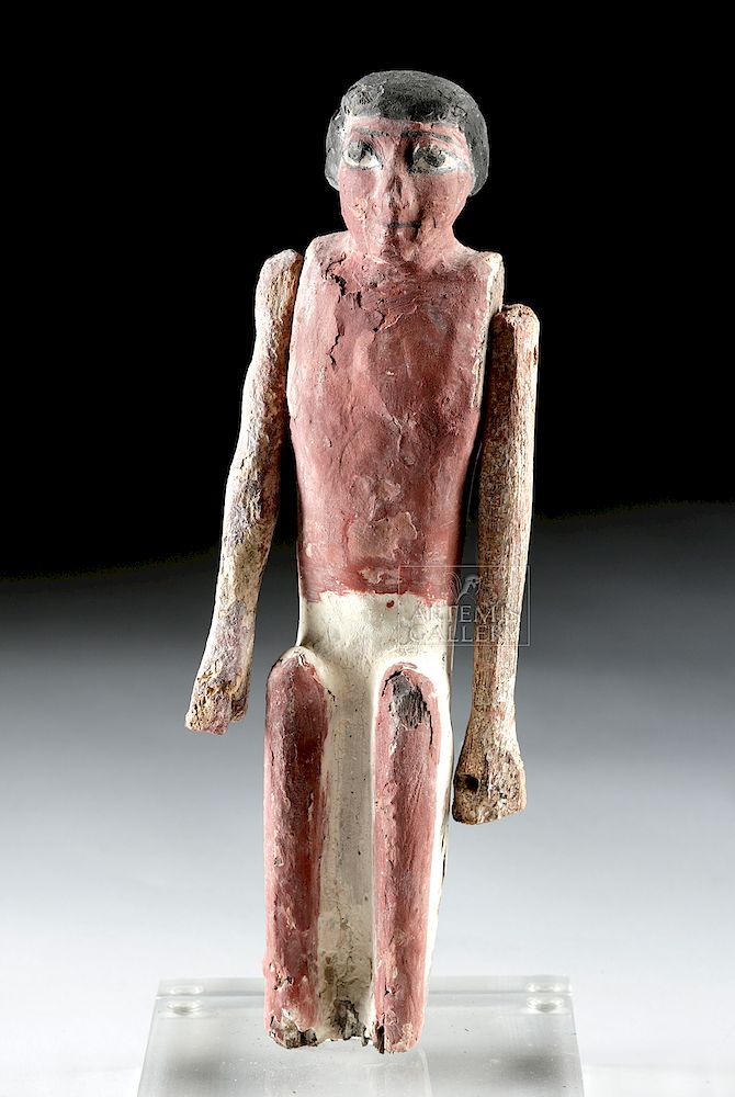 Appraisal: Egyptian Middle-Kingdom Wood Polychrome Boatman Egypt Middle Kingdom ca to