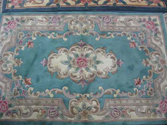 Appraisal: Chinese Sculptured Wool Rug floral green field ' '' x