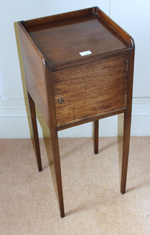 Appraisal: A Georgian pot cupboard with plain low gallery top