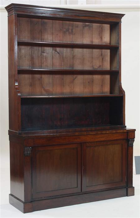 Appraisal: A th century mahogany bookcase and undercabinet the moulded cornice