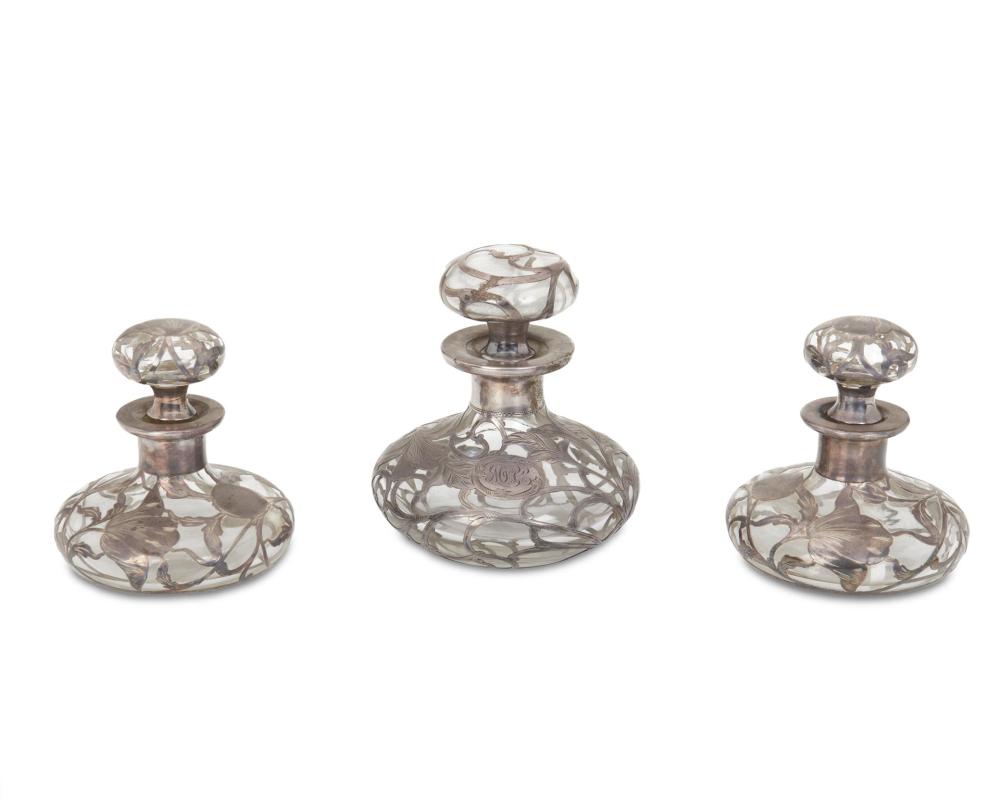 Appraisal: Three art glass and sterling silver overlay perfume bottles Late