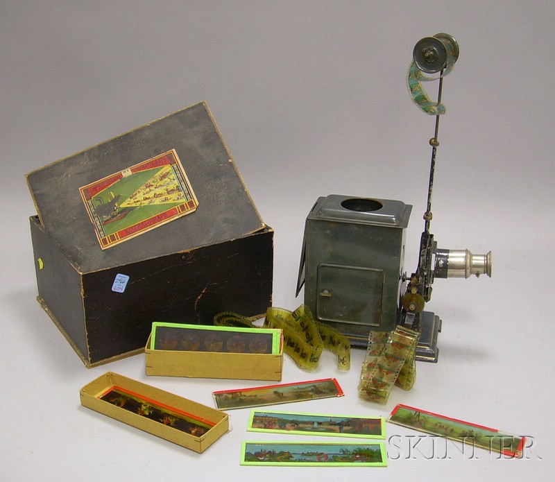 Appraisal: German Cinematograph Painted Tin Magic Lantern Projector with Twenty-two Color