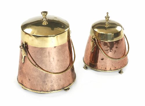 Appraisal: Two graduated copper and brass lidded buckets with swing handles