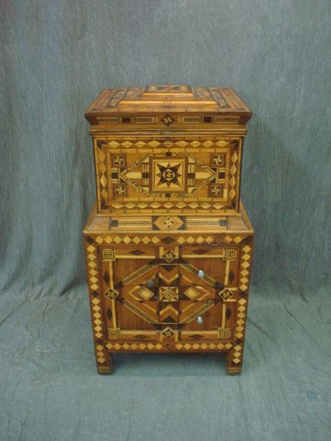 Appraisal: Marquetry Inlaid Cabinet The inside top section is cedar lined