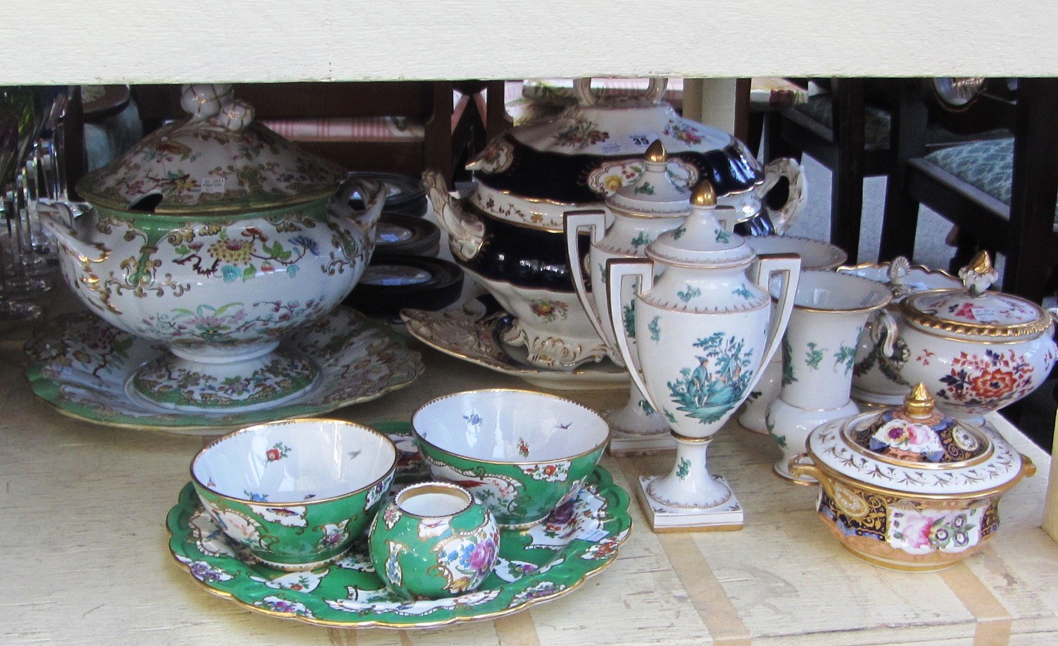 Appraisal: A Victorian tureen cover and stand decorated with flowers against