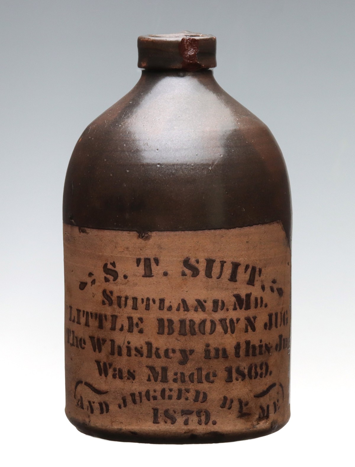 Appraisal: S T SUIT SUITLAND MD LITTLE BROWN WHISKEY JUG The