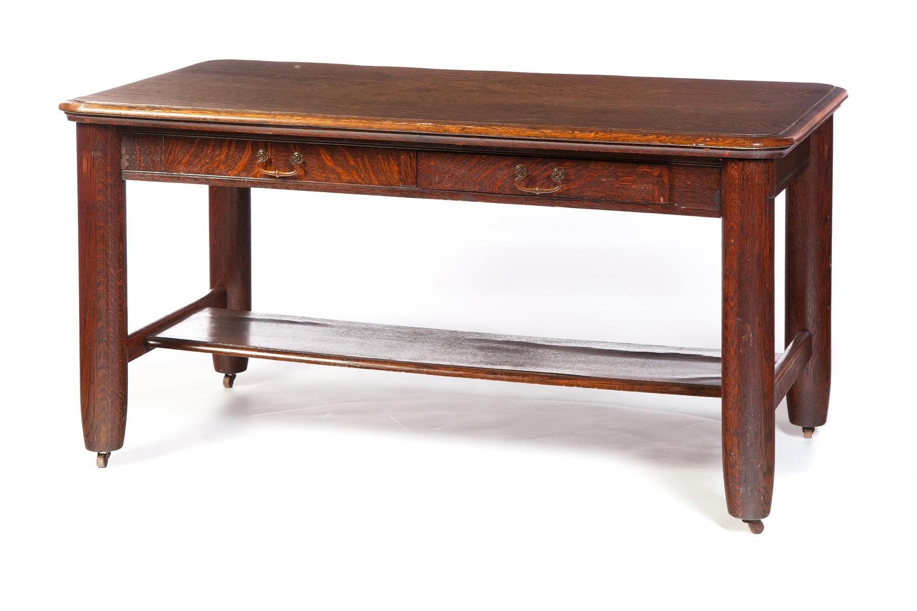 Appraisal: MISSION TWO-DRAWER LIBRARY TABLE American ca - oak Beveled rim