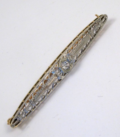 Appraisal: DIAMOND AND FOURTEEN KARAT GOLD PIN - in length and