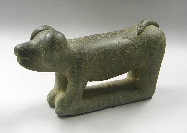 Appraisal: A carved stone pig Qing Dynasty The curly-tailed animal shown