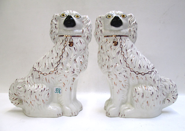 Appraisal: PAIR ENGLISH STAFFORDSHIRE PORCELAIN DOGS in opposing positions each with