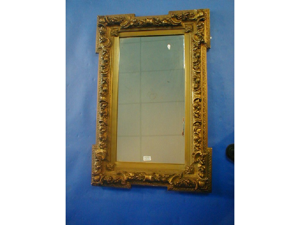 Appraisal: A thC heavy gilt plaster wall mirror decorated in high