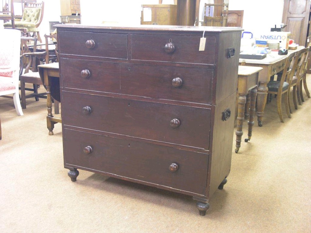 Appraisal: An early th century dark mahogany chest in two sections