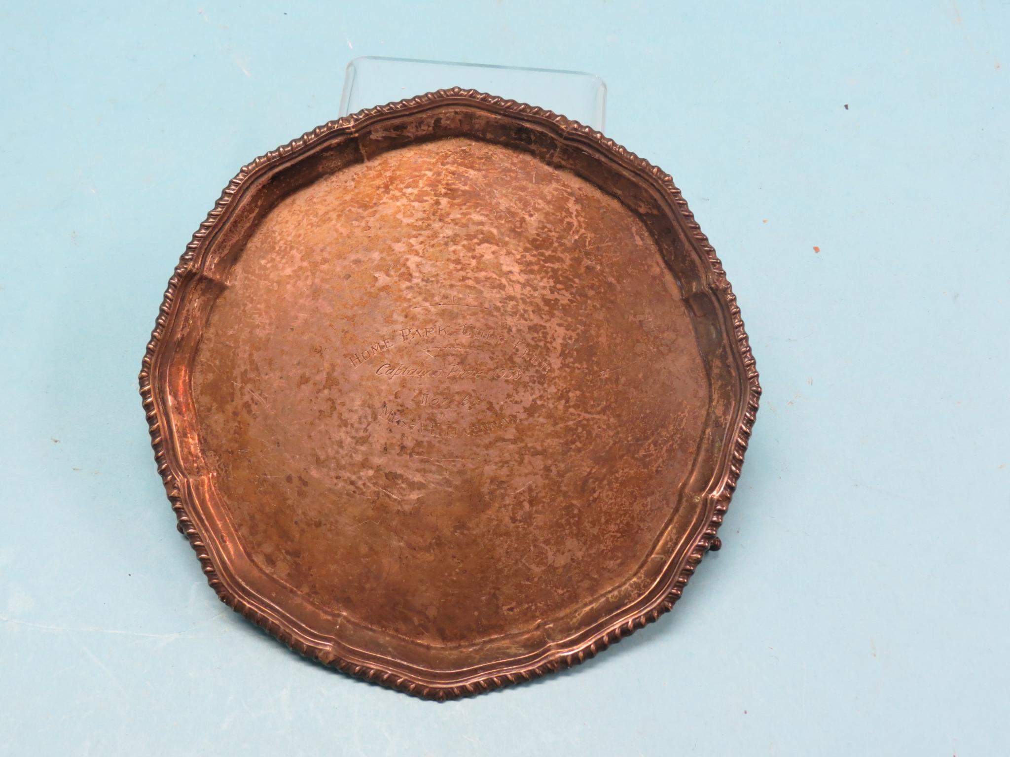 Appraisal: A silver card tray circular with gadrooned border claw feet