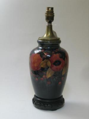 Appraisal: A MOORCROFT POTTERY LAMP of ovoid form tube lined in